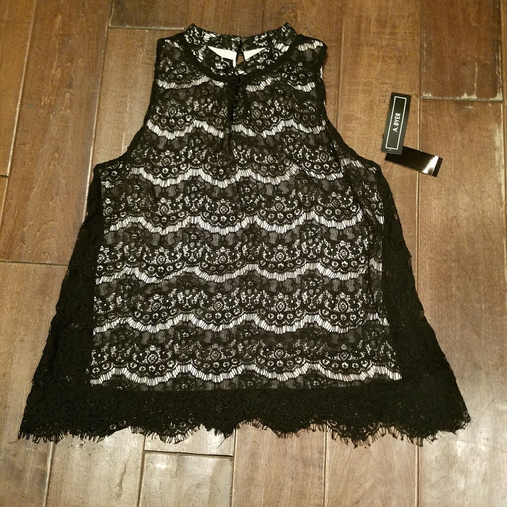 A. Byer sleeveless black lace top
